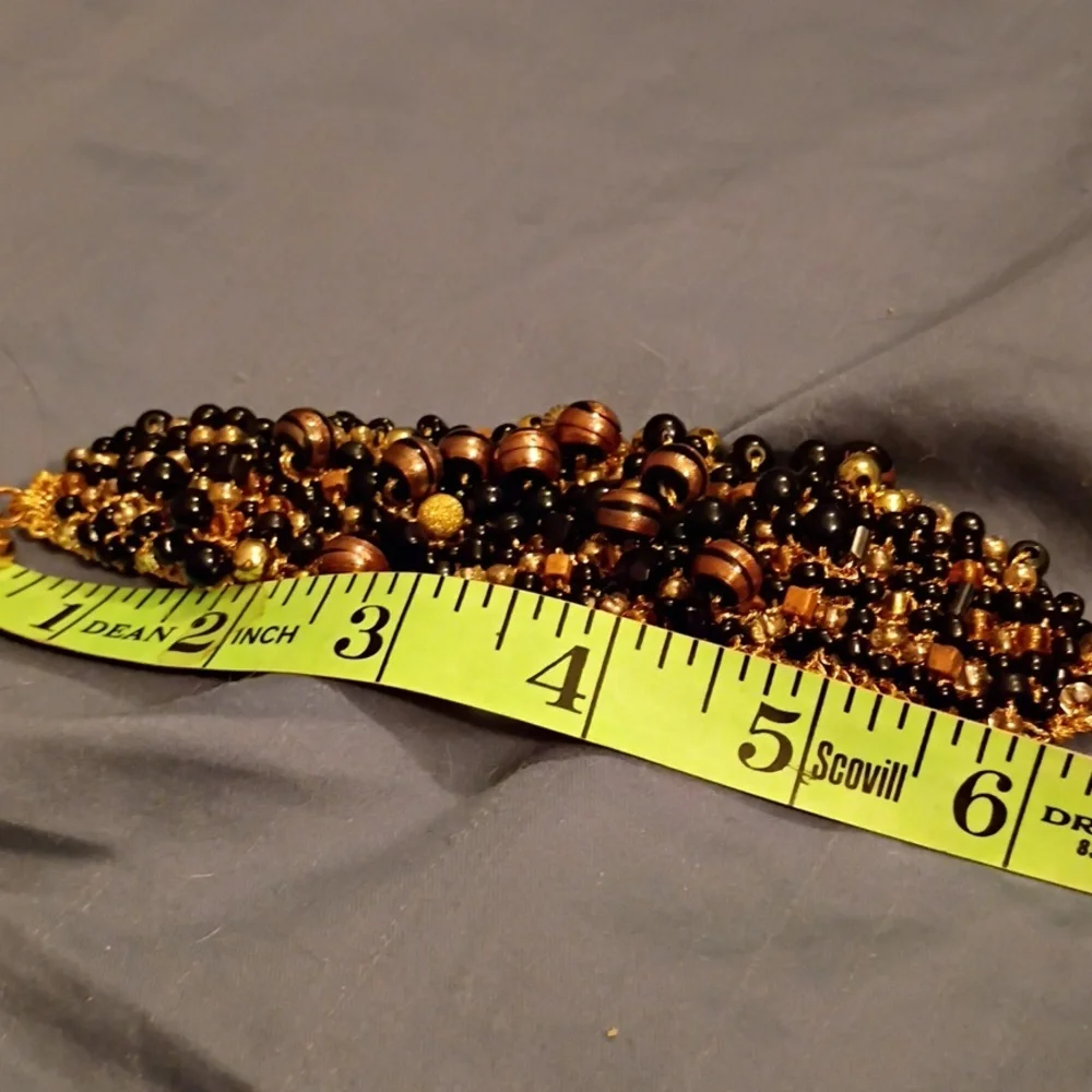 Vintage Black and Gold Beaded Bracelet Sewed With Elastic Thread.